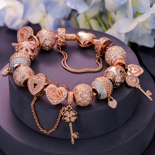 gona- Sterling Silver Rose in the Heart Charms Bracelet Set In Rose Gold Plated (Includes bracelet and all charms shown)