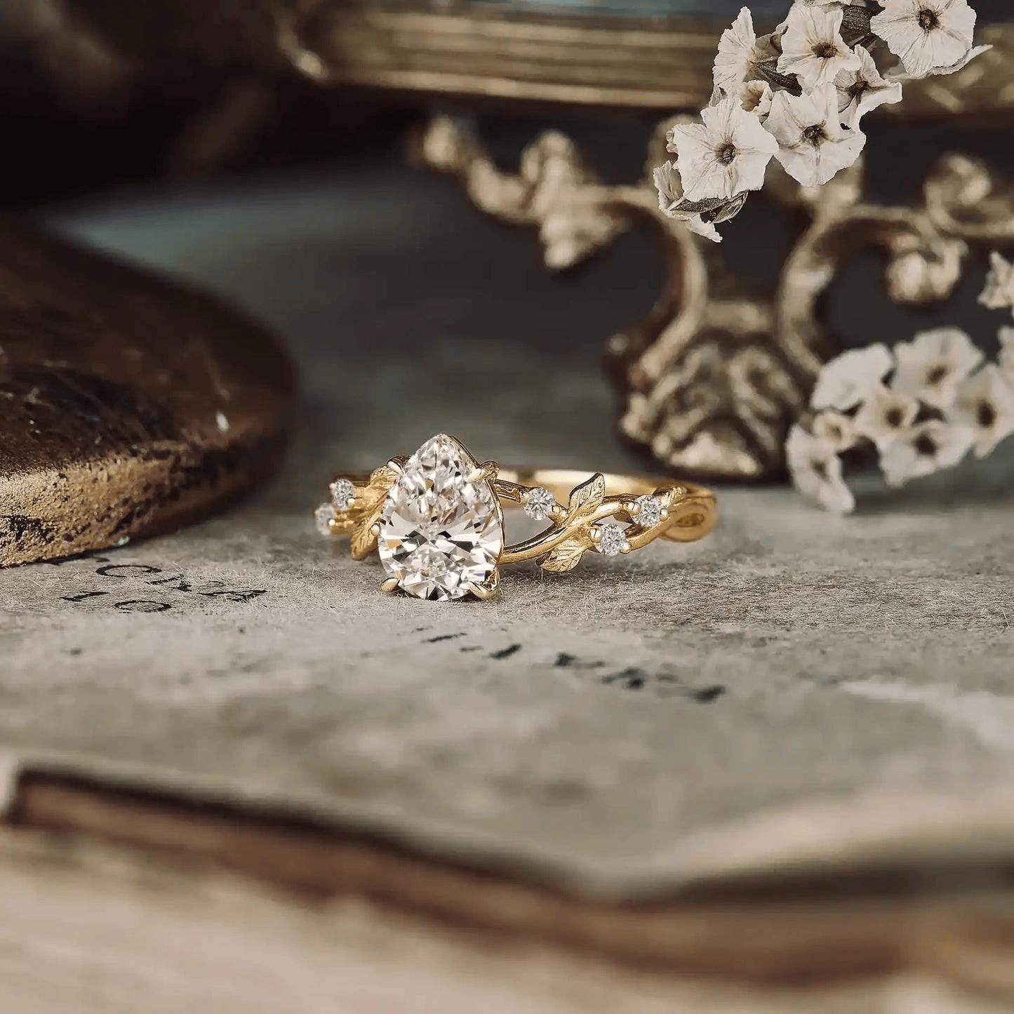 Enchanted Vine · 2.0 CT Pear Lab-Grown Diamond Engagement Ring with Leaf & Vine Accent Band in Solid 14K Yellow Gold · (Includes IGI Certification from International Gemological Institute)