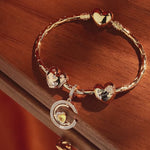 Sterling Silver Gleaming Affection Charms Bracelet Set In 14K Gold Plated (Includes bracelet and all charms shown)