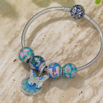 Sterling Silver Emerald Butterfly Dance Charms Bracelet Set With Enamel In White Gold Plated (Includes bracelet and all charms shown)