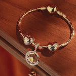 Sterling Silver Gleaming Affection Charms Bracelet Set In 14K Gold Plated