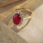 Oval Lab-Grown Ruby Halo Engagement Ring in 14K Yellow Gold Plated Silver