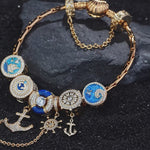 Sterling Silver Anchored in Ocean Serenity Charms Bracelet Set With Enamel In 14K Gold Plated (Includes bracelet and all charms shown)