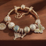 Sterling Silver Upward Blossoming Charms Bracelet Set In 14K Gold Plated (Includes bracelet and all charms shown)