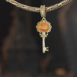 1. `Halloween Pumpkin & Key Pavé Dangle Charm In Tarnish‑Resistant Silver` 2.