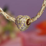 Enchanted Time-Twisted Heart Tarnish-Resistant Silver Charm In 14K Gold Plated